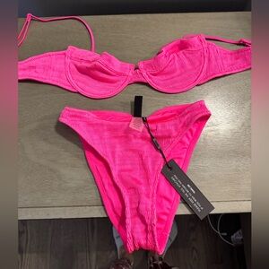 Triangle hot pink bikini.